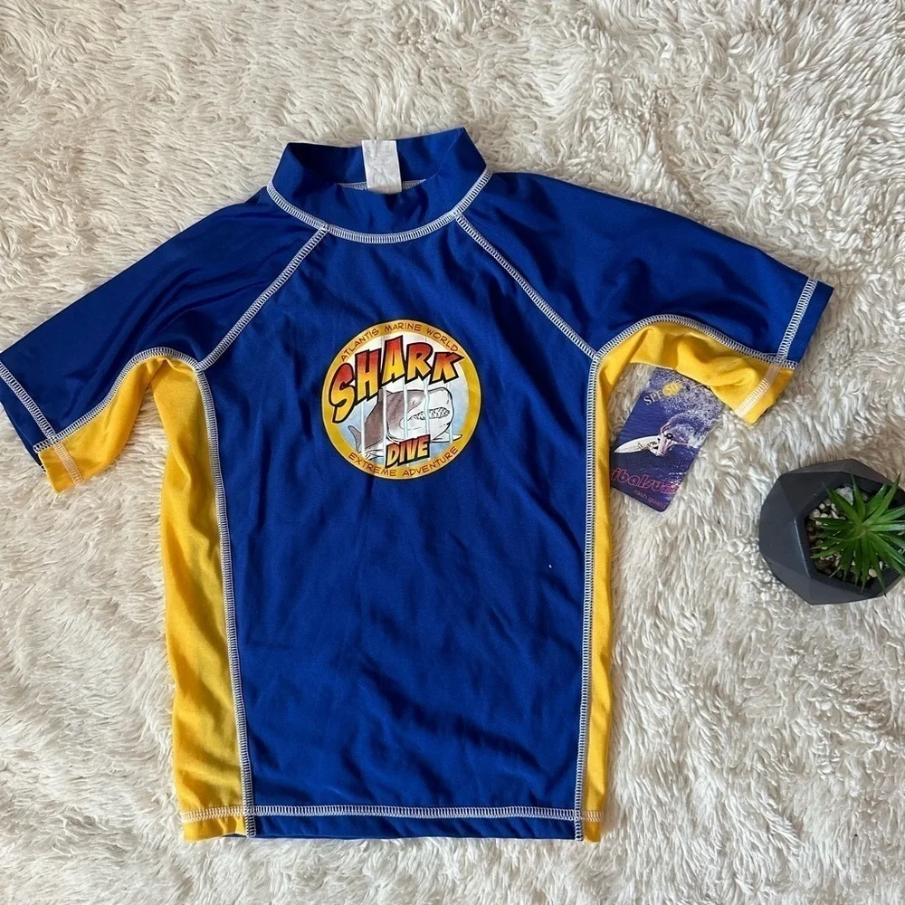 NWT tribalsurf rash guard  size Medium 12/14